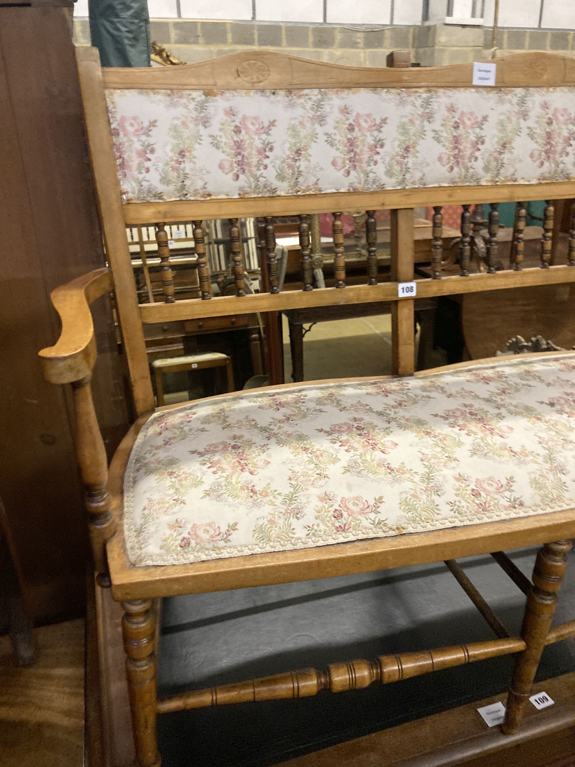 A late Victorian chair back settee, length 110cm, depth 44cm, height 90cm